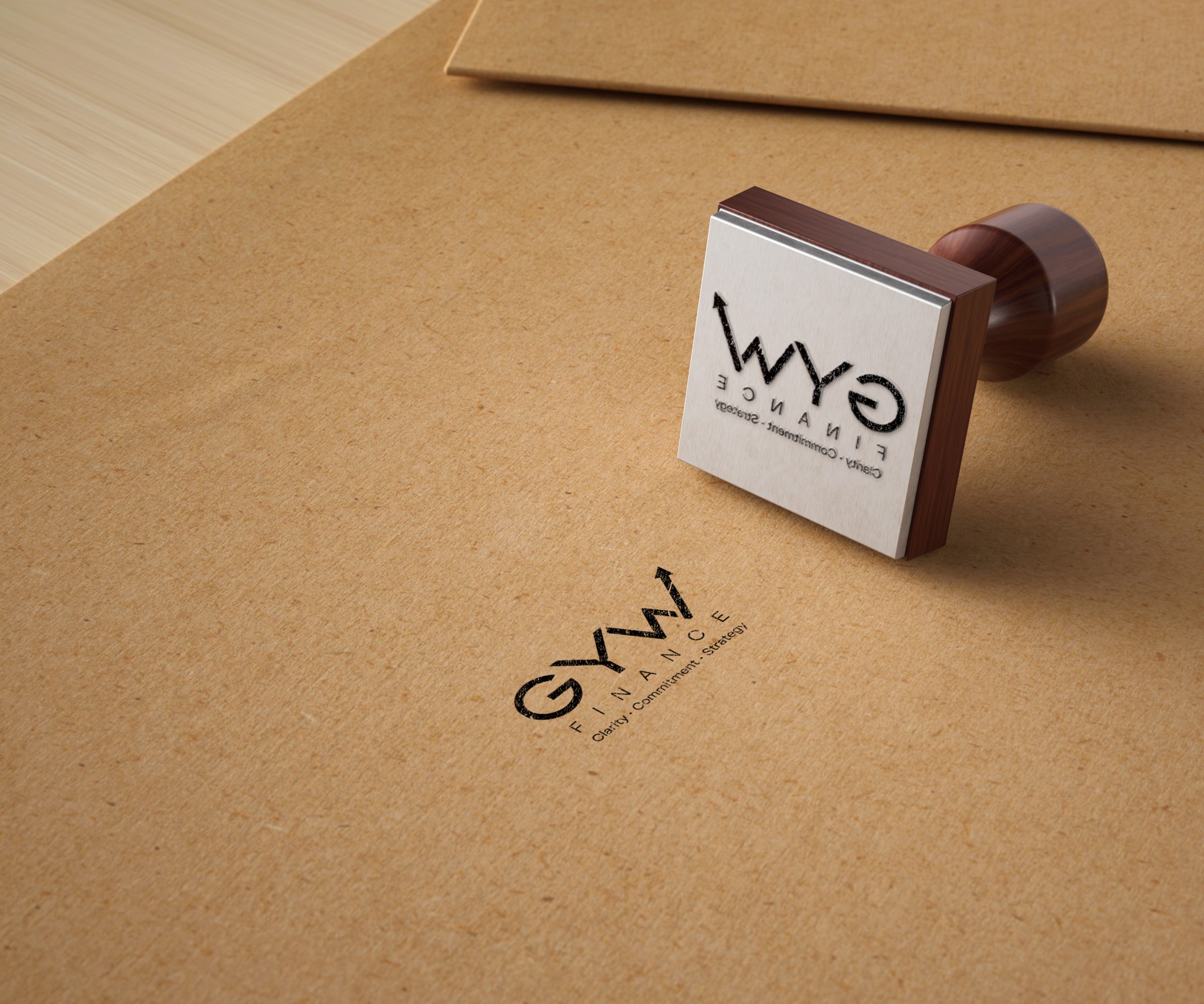 A rubber stamp of the GYW logo on kraft paper