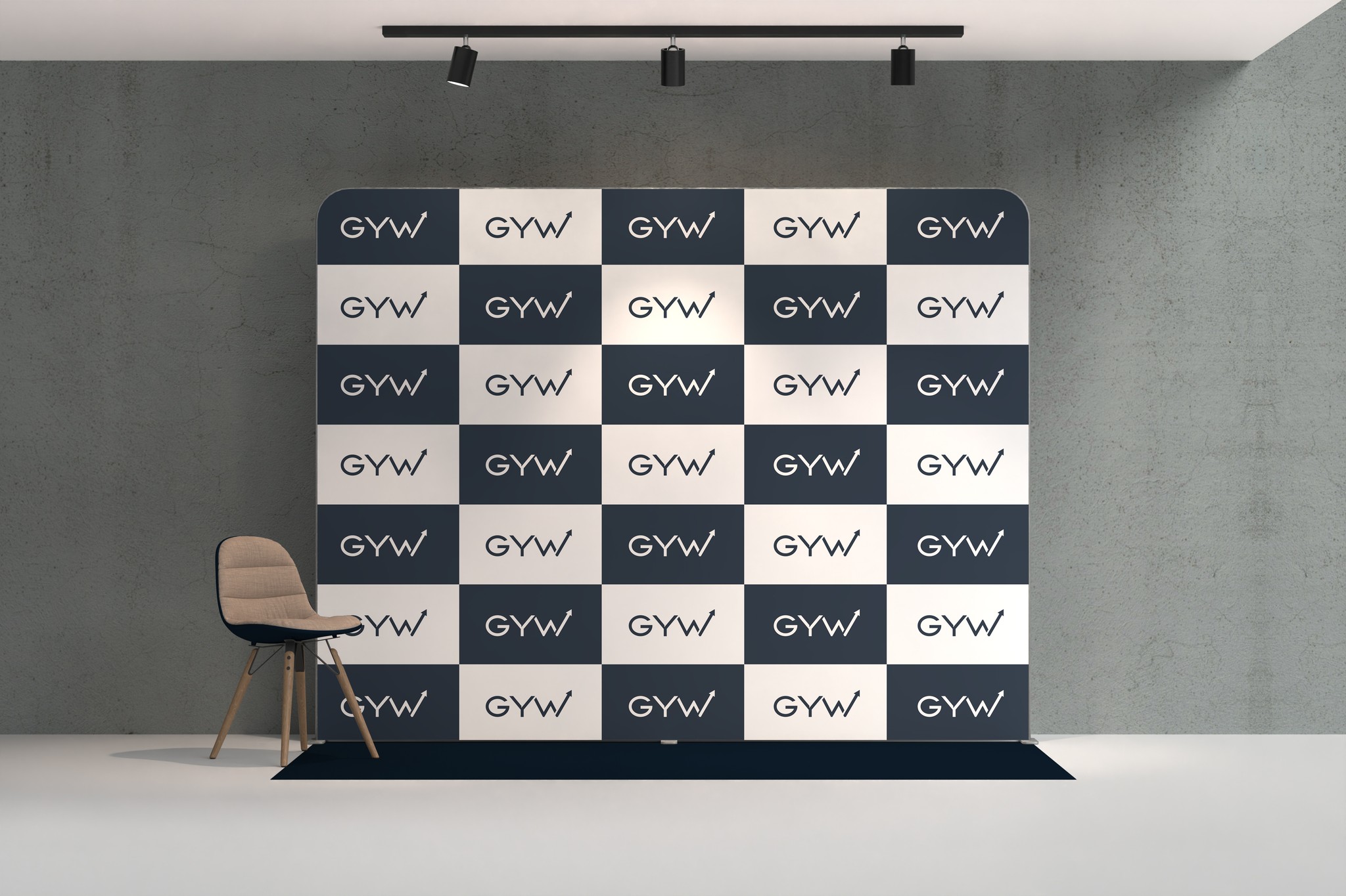 An event backdrop with a repeating GYW logo pattern