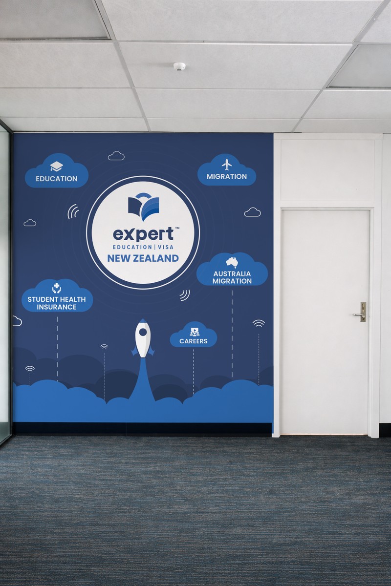 A dark blue illustrated office wall with the Expert logo and a rocket