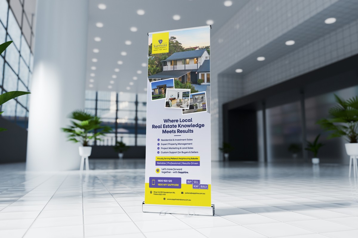 A Sapphire roll-up banner in a bright lobby